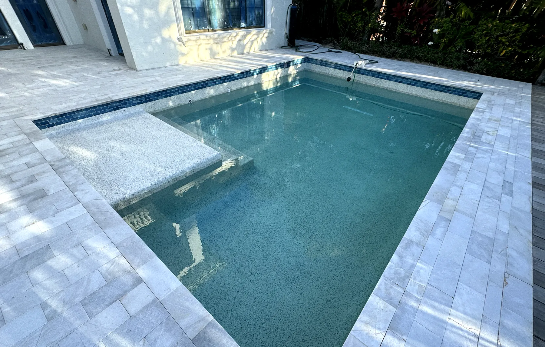 Coastal Key finished pool reflection and residence